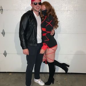 Knee high black heeled boots